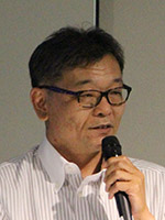 富永 哲欣 氏